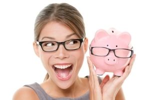 woman holding a coin toy pig 